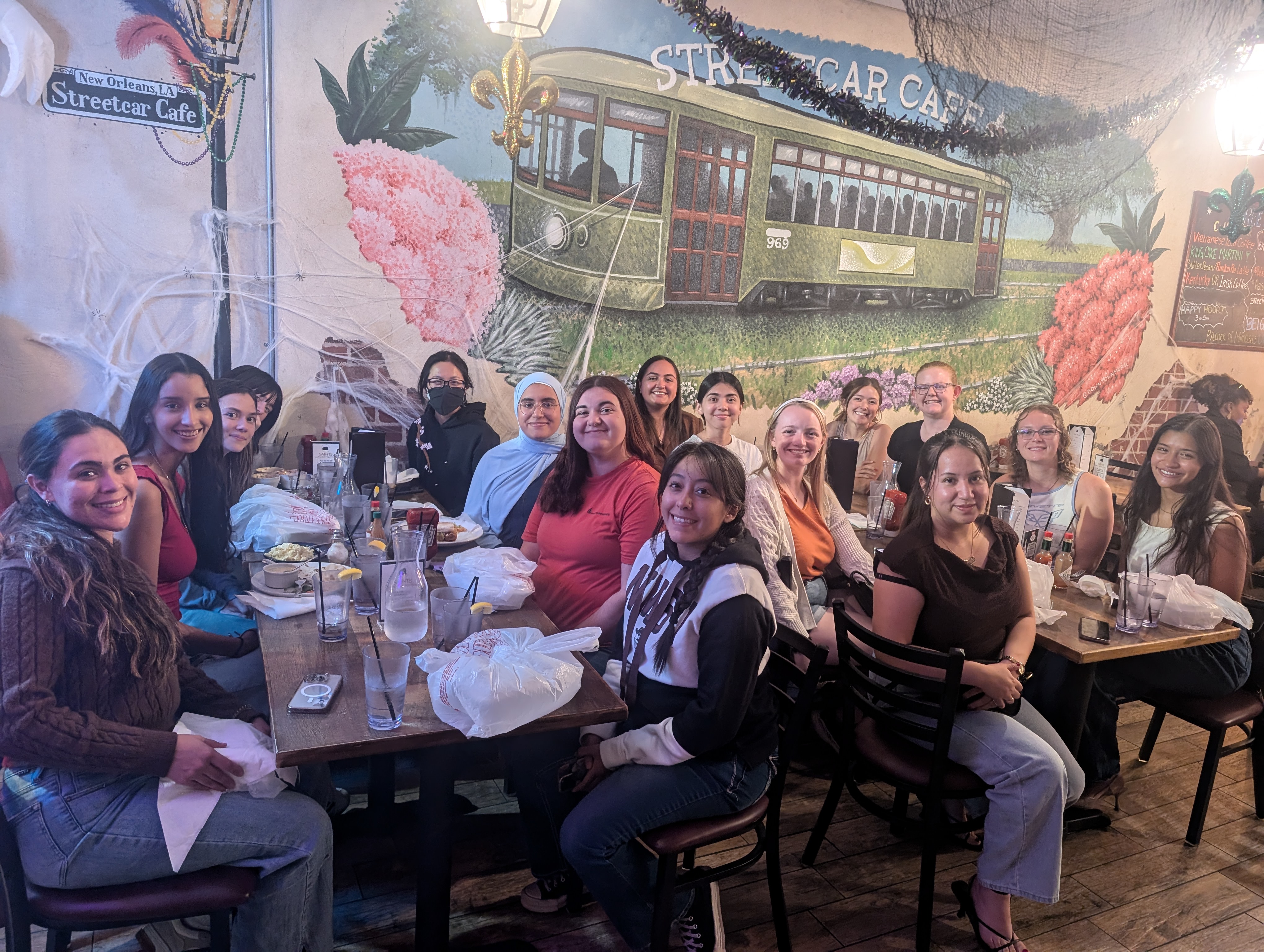 SWE Women sitting at restaurant